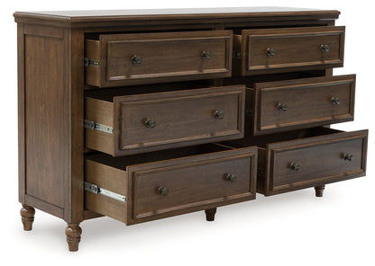 Sturlayne Brown Upholstered Panel Bedroom Set from Ashley - Luna Furniture