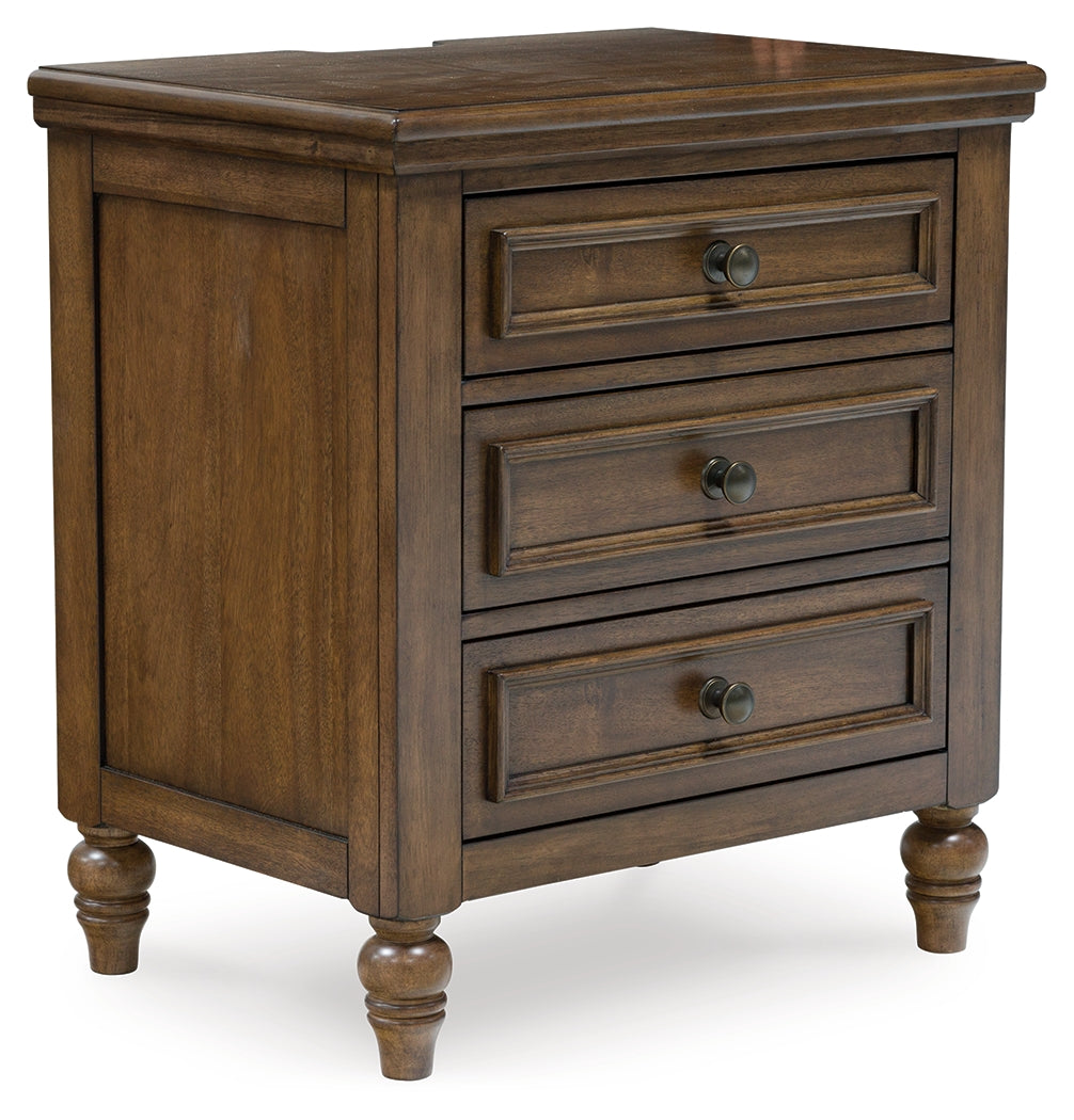 Sturlayne Brown Upholstered Panel Bedroom Set from Ashley - Luna Furniture