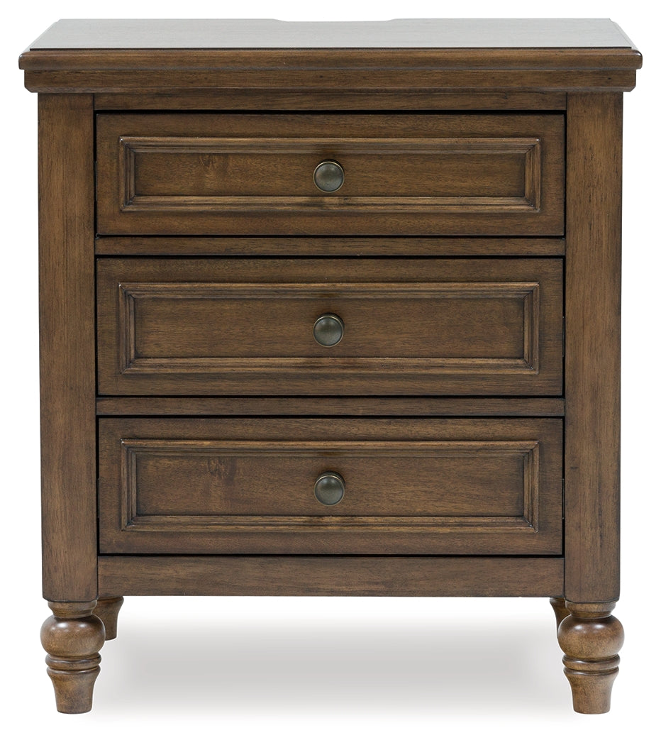 Sturlayne Brown Upholstered Panel Bedroom Set from Ashley - Luna Furniture