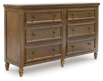 Sturlayne California King Upholstered Panel Bed with Dresser and 2 Nightstands in Brown from Ashley - Luna Furniture