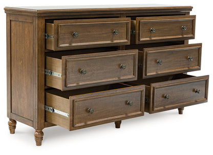 Sturlayne California King Upholstered Panel Bed with Dresser and 2 Nightstands in Brown from Ashley - Luna Furniture
