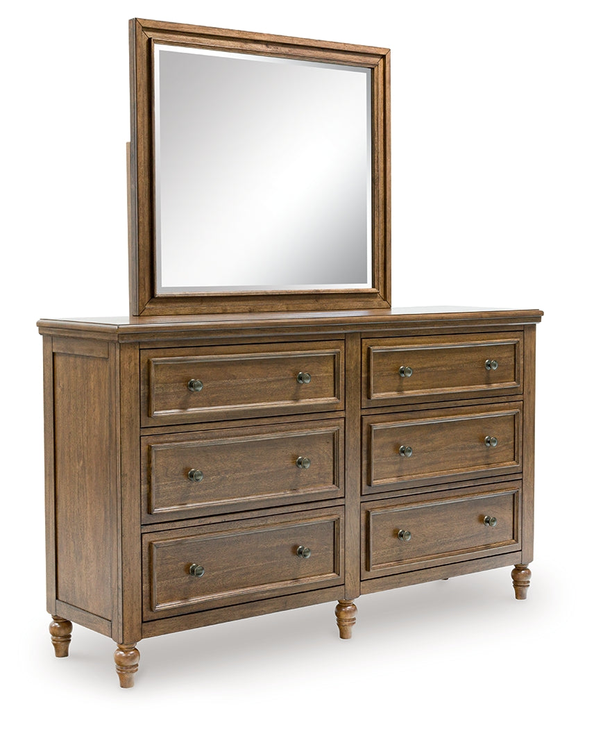 Sturlayne King Upholstered Panel Bed with Mirrored Dresser and Nightstand in Brown from Ashley - Luna Furniture