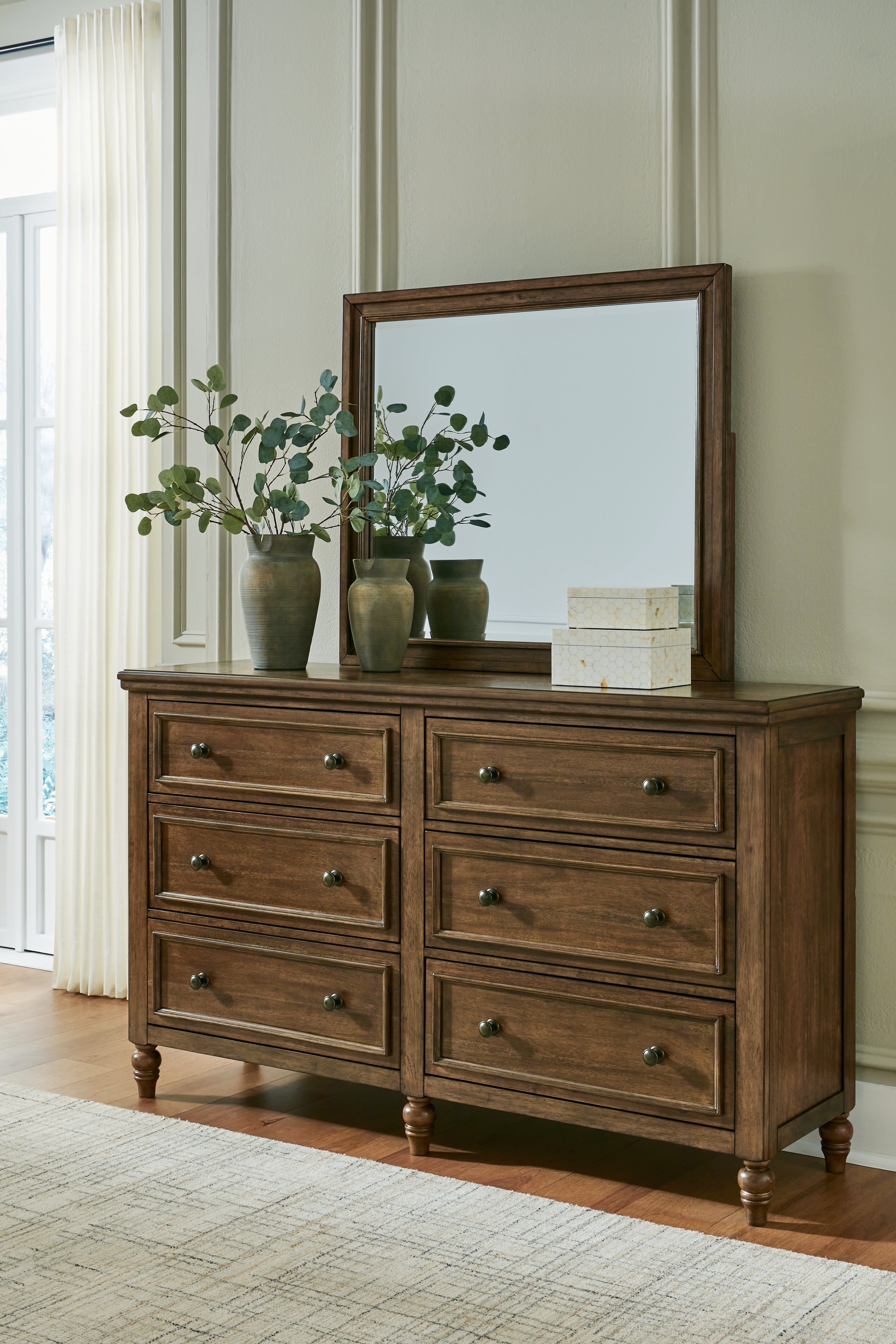 Sturlayne King Upholstered Panel Bed with Mirrored Dresser, Chest and 2 Nightstands in Brown from Ashley - Luna Furniture