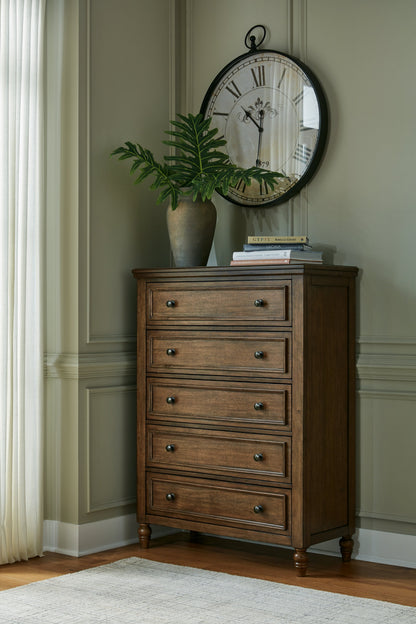 Sturlayne King Upholstered Panel Bed with Mirrored Dresser, Chest and 2 Nightstands in Brown from Ashley - Luna Furniture