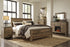 Trinell King Panel Bed with Dresser, Chest and Nightstand in Brown from Ashley - Luna Furniture