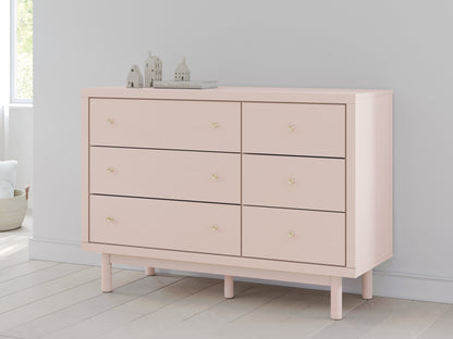 Wistenpine Full Upholstered Panel Headboard with Dresser in Blush - PKG018716