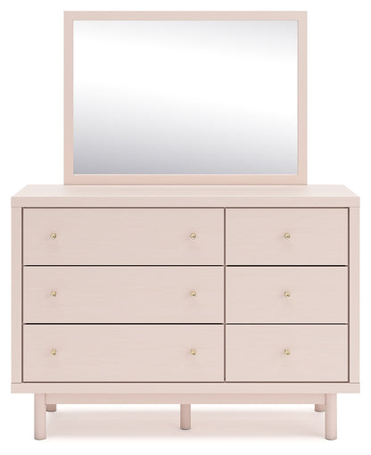 Wistenpine Twin Upholstered Panel Headboard with Mirrored Dresser in Blush - PKG018707