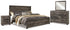 Wynnlow King Panel Bed with Mirrored Dresser and Nightstand in Gray - PKG014054
