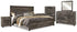 Wynnlow King Panel Bed with Mirrored Dresser, Chest and 2 Nightstands in Gray - PKG006365