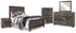 Wynnlow Queen Crossbuck Panel Bed with Mirrored Dresser, Chest and 2 Nightstands in Gray - PKG006369
