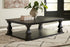 Wellturn Black Coffee Table - T749-1 - Bien Home Furniture & Electronics